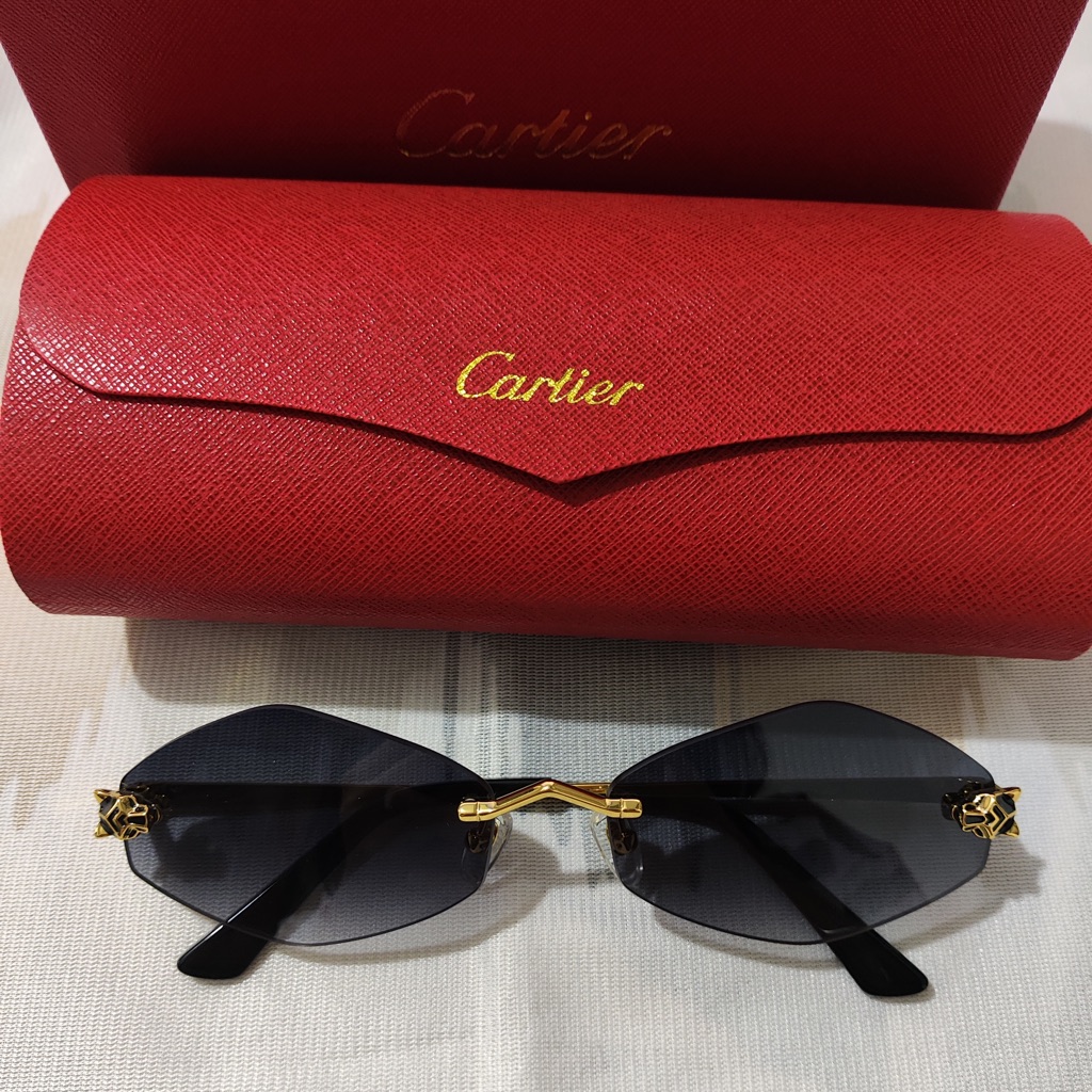 Cartier Rimless Sunglasses With Black Gradient Lenses And Gold Accents